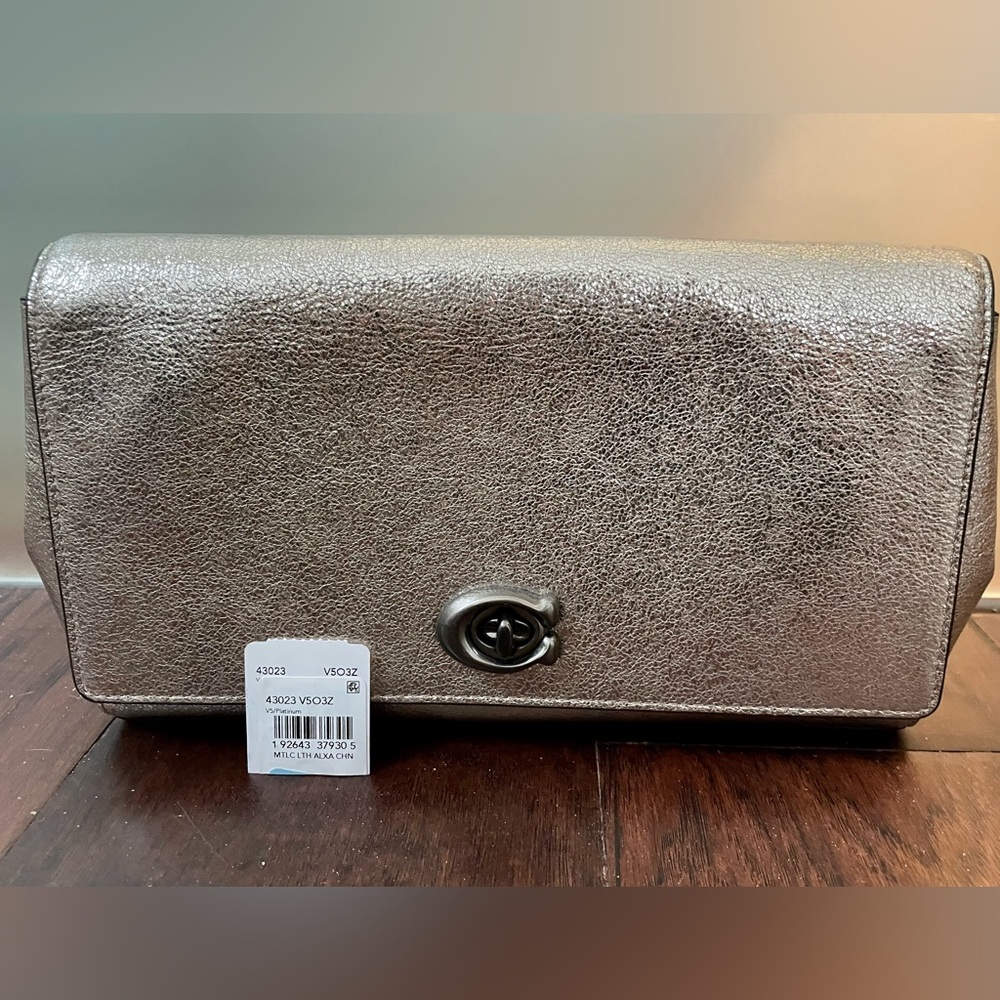 Coach ALEXA METALLIC TURNLOCK CLUTCH IN SMOOTH LEATHER. Platinum. NWT